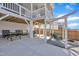 Back patio with ample seating, dining area, and outdoor entertaining space at 492 Arlie Ln, Lillington, NC 27546