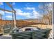 Backyard firepit with swing set and wooden privacy fence in place at 492 Arlie Ln, Lillington, NC 27546