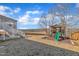 Large backyard featuring a deck and patio area and a playground at 492 Arlie Ln, Lillington, NC 27546