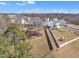 Spacious backyard featuring a charming playset and wooded backdrop, perfect for outdoor enjoyment at 492 Arlie Ln, Lillington, NC 27546