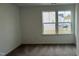 Bedroom with neutral carpet and large windows at 5004 Cambrey Dr # 3, Durham, NC 27703