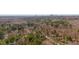 Aerial view of the tree-lined neighborhood in close proximity to the city skyline at 5902 Carmel Ln, Raleigh, NC 27609