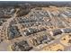 Expansive aerial view of a large neighborhood with a variety of home styles and street layouts at 6301 Kayton St, Raleigh, NC 27616