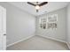 Cozy bedroom with a ceiling fan and natural light, perfect for relaxation at 684 Wickham Ridge Rd, Apex, NC 27539