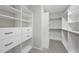 Organize your wardrobe in this walk-in closet with custom shelving and plenty of storage at 684 Wickham Ridge Rd, Apex, NC 27539