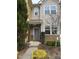 Inviting front entrance with a gray front door and manicured shrubbery at 684 Wickham Ridge Rd, Apex, NC 27539