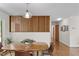 Dining room featuring hardwood floors, and stylish light fixture at 703 Caswell Rd, Chapel Hill, NC 27514