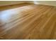 Detailed view showcasing the gleaming hardwood floors and neutral-colored walls at 703 Caswell Rd, Chapel Hill, NC 27514