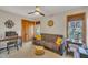 Versatile bedroom with sofa, desk, and closet, perfect for guests or a home office at 723 Chelsea Dr, Sanford, NC 27332