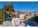 Cozy backyard deck furnished with rocking chairs and offering an outdoor living space at 7525 Poplar Meadow Ln, Raleigh, NC 27616