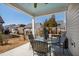 Inviting covered patio with outdoor seating, perfect for relaxing and entertaining at 7525 Poplar Meadow Ln, Raleigh, NC 27616
