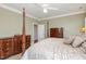 Spacious bedroom with beautiful furniture and neutral walls at 7800 Twin Pines Way, Fuquay Varina, NC 27526