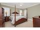 Large bedroom with furniture and a ceiling fan at 7800 Twin Pines Way, Fuquay Varina, NC 27526