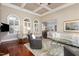 Spacious living room with high ceilings, a fireplace, a crystal coffee table and an open floor plan at 7800 Twin Pines Way, Fuquay Varina, NC 27526