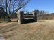 Stone sign reading 'Captains Landing' in a grassy area with trees in the background at 810 Jasmine Rd, Fuquay Varina, NC 27526