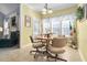 Cozy breakfast nook featuring an octagonal table, natural light, and views of the outdoors at 82 Wood Valley Dr, Four Oaks, NC 27524