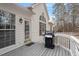 Back porch with outdoor grill and backyard view at 8513 Barrett Hall Ln, Wake Forest, NC 27587