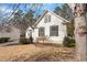 Side view of a brick home showcasing window details and landscaping at 8513 Barrett Hall Ln, Wake Forest, NC 27587