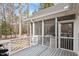 Screened porch and white railing offers a nice backyard view at 8513 Barrett Hall Ln, Wake Forest, NC 27587