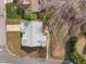 Aerial view of the home showcasing the well-manicured lawn, landscape design, and quiet neighborhood at 100 W Acres Cres, Cary, NC 27519