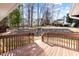 Inviting backyard with a patio and stone steps leading to a grassy area at 100 W Acres Cres, Cary, NC 27519