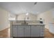 Open kitchen design with granite countertop, sink, and dishwasher at 100 W Acres Cres, Cary, NC 27519