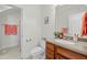 This bathroom features a single vanity with an elegant countertop and decor at 10040 Ward, Chapel Hill, NC 27517