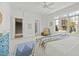 Airy bedroom with a blue dresser and a light blue patterned rug at 10040 Ward, Chapel Hill, NC 27517