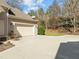 Attached garage, neat exterior and a well-kept yard offer an inviting glimpse of this property's charm at 10040 Ward, Chapel Hill, NC 27517