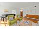 Elegant living room featuring hardwood floors, natural light, and stylish furnishings at 10040 Ward, Chapel Hill, NC 27517