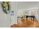 Open-concept living room with hardwood floors, neutral colors, and access to multiple living spaces at 10040 Ward, Chapel Hill, NC 27517