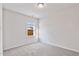 Neutral bedroom featuring carpet flooring and a window for natural light at 1008 Sandtrap Way, Durham, NC 27703