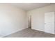 Neutral bedroom featuring carpet flooring and a door to hallway at 1008 Sandtrap Way, Durham, NC 27703