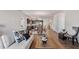 Open-concept living room seamlessly connects to the dining area and kitchen at 1008 Sandtrap Way, Durham, NC 27703