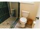 Bathroom with a tiled shower and modern fixtures. Basket provides storage at 106 Choptank Ct # B3, Cary, NC 27513