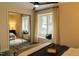 Sun-drenched bedroom with mirrored closets and a window seat creates a bright and inviting space for comfort at 106 Choptank Ct # B3, Cary, NC 27513