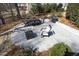 Outdoor patio features a fire pit, patio table, and chair, perfect for entertaining and outdoor relaxation at 106 Rolling Meadows Ln, Chapel Hill, NC 27517