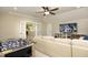 Well-lit game room features a large screen TV, sectional sofa, and foosball table at 106 Rolling Meadows Ln, Chapel Hill, NC 27517