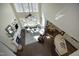 Spacious living room features large windows, a fireplace, and an open floor plan at 106 Rolling Meadows Ln, Chapel Hill, NC 27517
