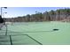 Outdoor tennis courts offer an ideal balance of sunlight and shade for recreational play at 106 Rolling Meadows Ln, Chapel Hill, NC 27517