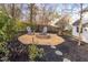 Backyard area featuring a fire pit and wood chip ground cover at 107 Kingsmill Rd, Cary, NC 27511