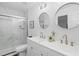 Elegant bathroom with double vanity, modern fixtures, and a luxurious glass-enclosed shower at 107 Kingsmill Rd, Cary, NC 27511