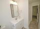 Modern bathroom with a sleek vanity, updated fixtures, a glass-enclosed shower, and stylish flooring at 108 Torain St, Hillsborough, NC 27278