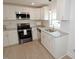 Efficient kitchen with stainless steel appliances and ample counter space at 108 Torain St, Hillsborough, NC 27278