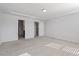 Expansive Primary bedroom with neutral walls, carpet, and a glimpse into the attached bathroom at 110 Cambria Ln, Morrisville, NC 27560