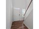 Inviting foyer with hardwood floors, a front door, and a staircase at 110 Cambria Ln, Morrisville, NC 27560