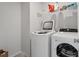 Functional laundry area with modern washer and dryer at 110 Cambria Ln, Morrisville, NC 27560