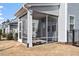 View of the screened in porch that offers ample space for outdoor furniture and relaxation at 110 Cambria Ln, Morrisville, NC 27560