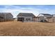 Wide shot of backyard featuring screened-in porch, pergola, and shed at 1112 Leatherstone Ln, Fuquay Varina, NC 27526