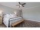 Inviting main bedroom with a neutral palette and a decorative area rug at 1112 Leatherstone Ln, Fuquay Varina, NC 27526